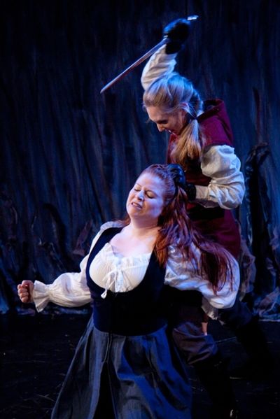 Lady Macduff (Rachel Stubbs) is murdered by Lenox (Gillian N. Humiston) Photo